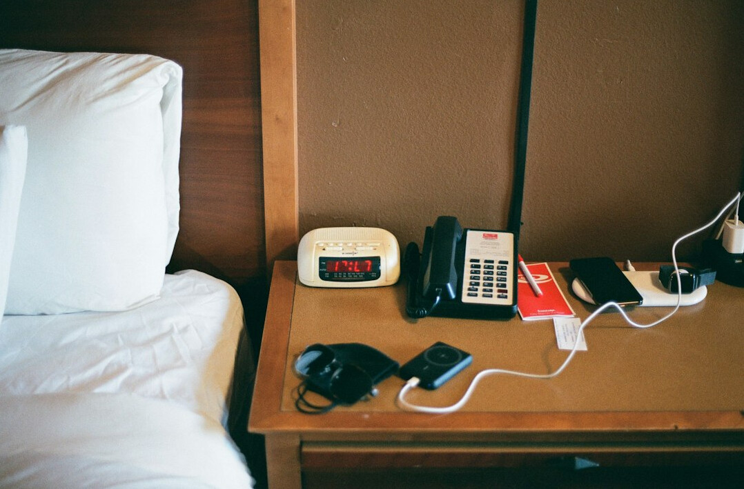 Reception desk with a notebook and a telephone