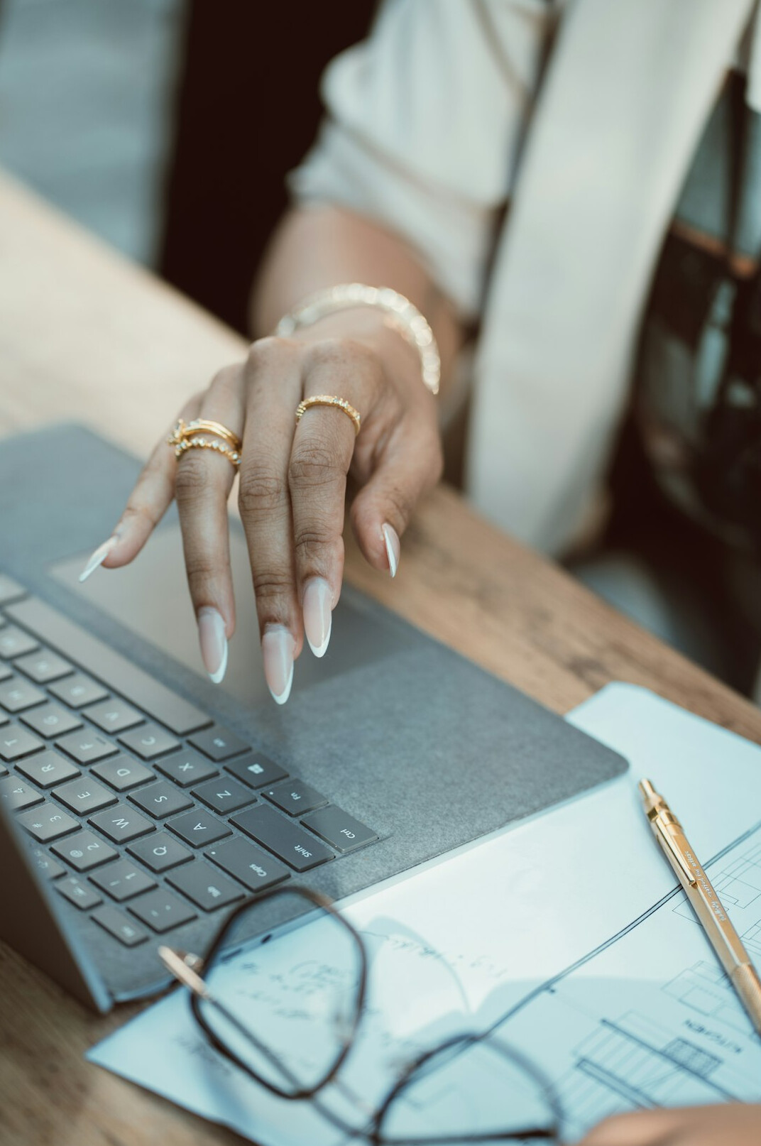 person managing budget on laptop