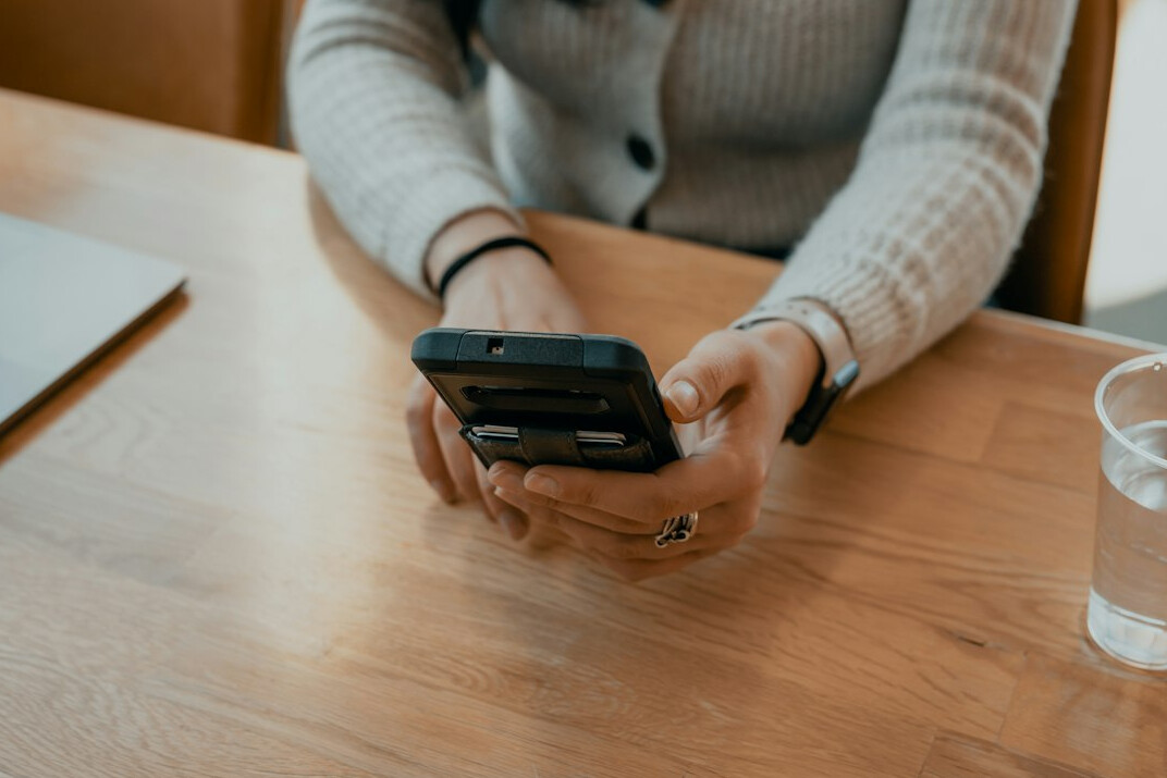 person using smartphone banking