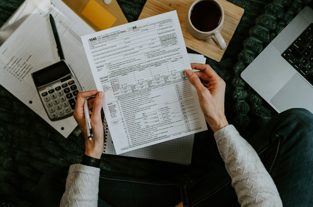 person reviewing budget spreadsheet